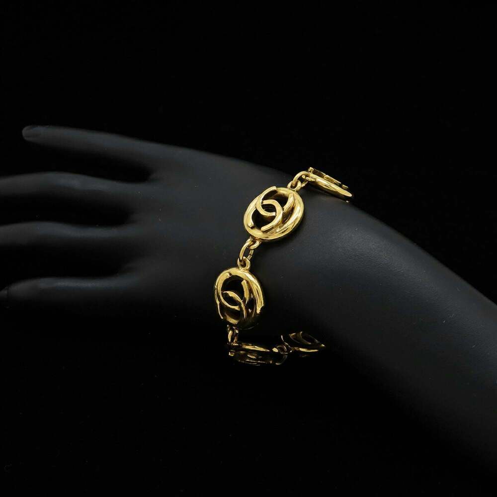 CHANEL Gold Logo Charm Bracelet - Picture 7 of 7
